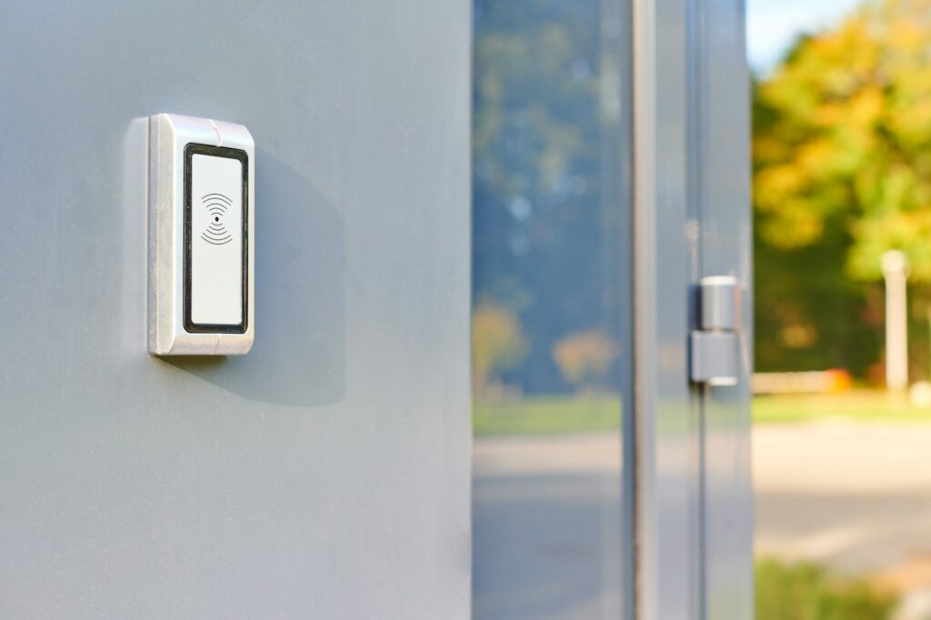 RFID reader by office door, employees only access by RFID key card, lock and key control system. RFID Tag Mandates.